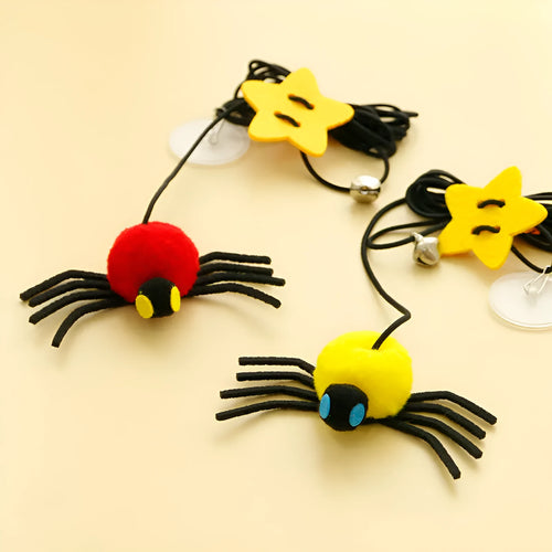 Cat hanging door toy with red feather and bell spider dangling from elastic rope
